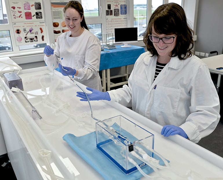 two female researchers working in a lab