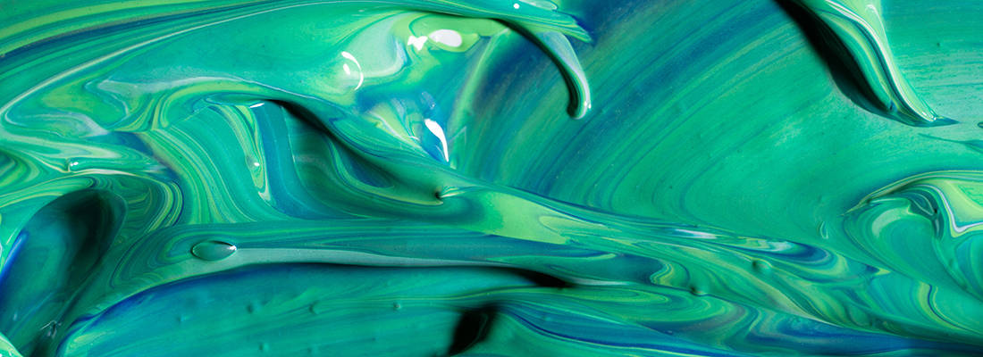 Green, white and blue paint mixing 