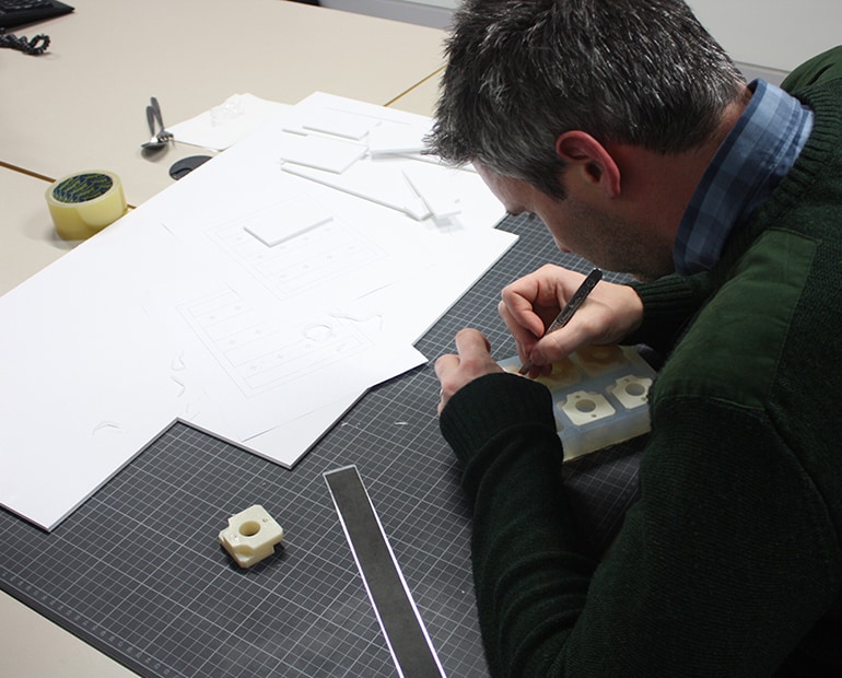 Engineer working on 3D printed prototypes