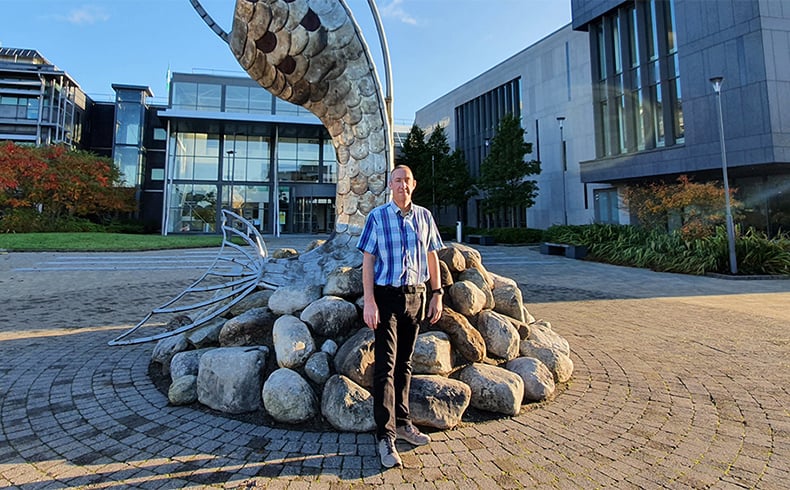 Russell Macpherson, Technology Gateway Manager at PEM Gateway stands in front of the ‘Salmon of Knowledge sculpture based at ATU Sligo