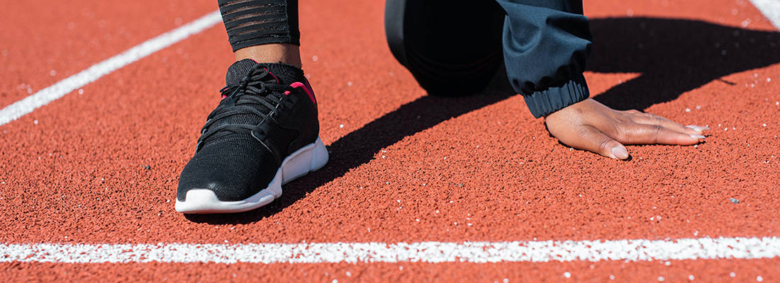 Close up of athletic on start line