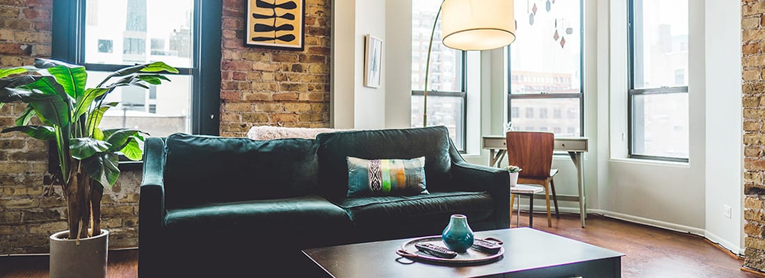 Green sofa in living room 