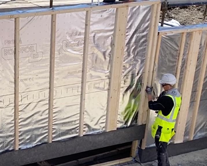 Engineer working on timber frame panels