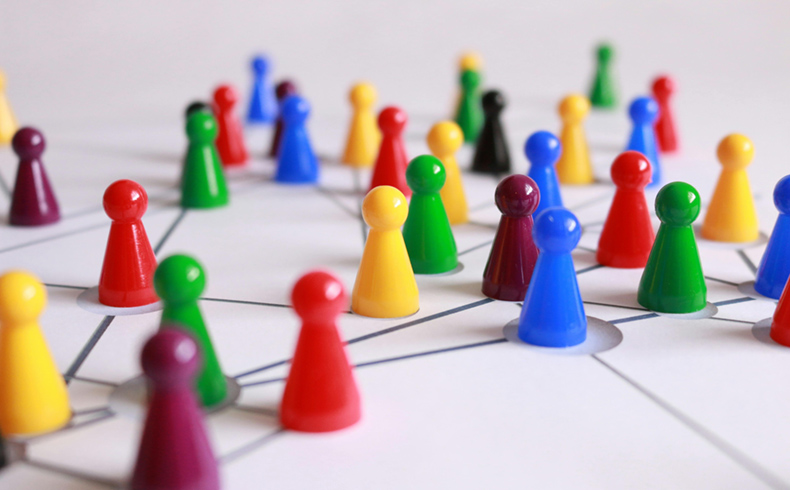 Colourful Plastic Cones on White Lined Surface