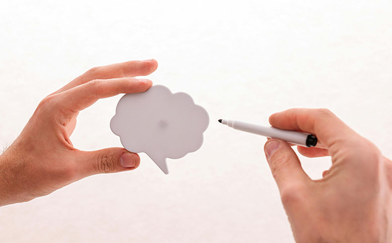 A Person Holding a Marker and a Thought Bubble
